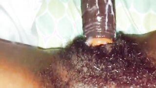Big dildo inside black hairy wet pussy
